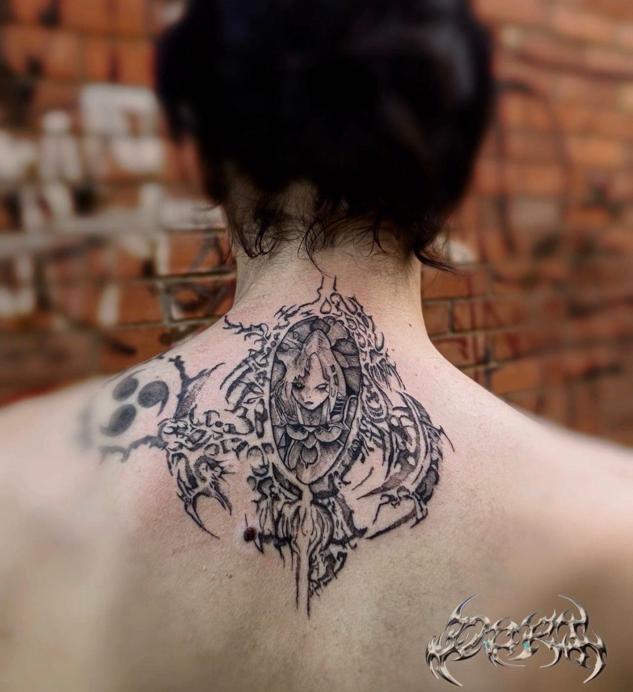 Alicia the Black tat
